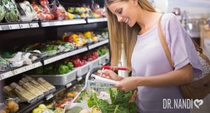 Woman Grocery Shopping in Produce